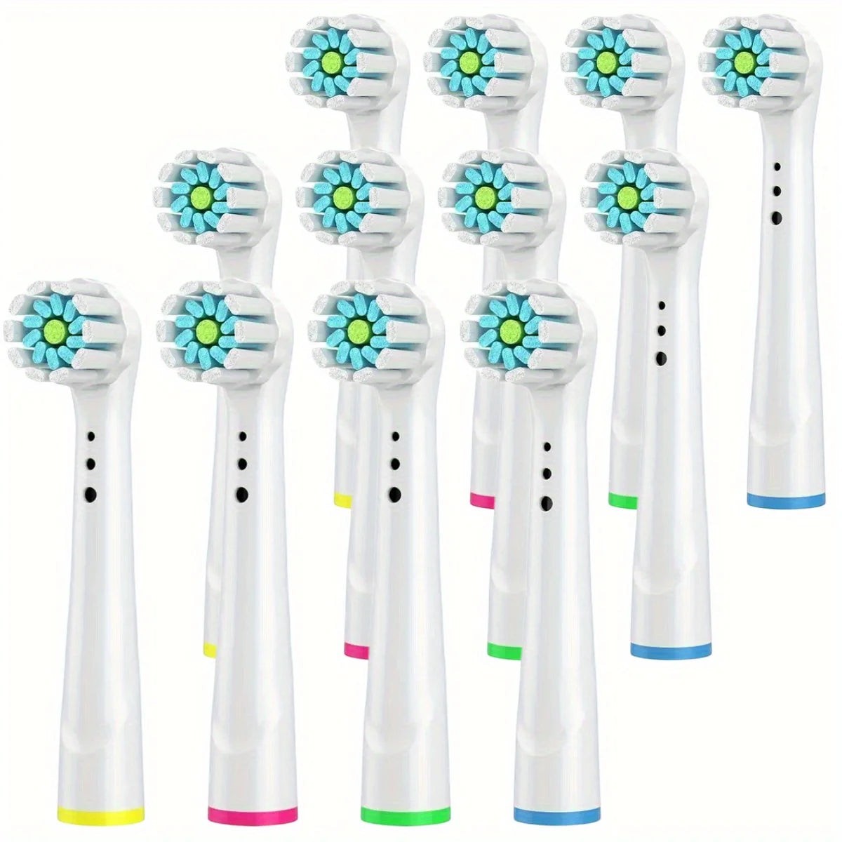 Variedad Online Cabezales de cepillo de dientes eléctricos de repuesto, blancos con cerdas azules y verdes, anillos de colores en la base.