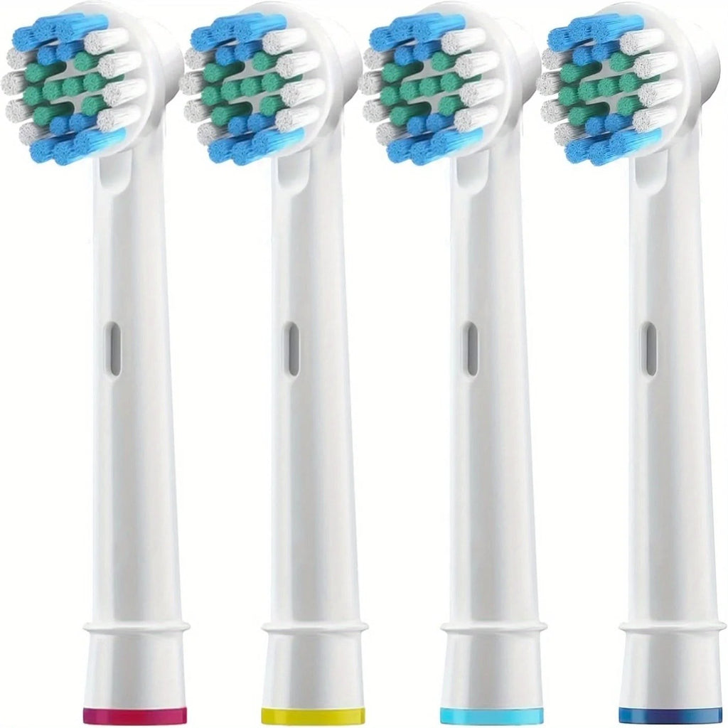 Cabezales de cepillo de dientes eléctricos de repuesto Variedad Online, cerdas azules y verdes, con anillos de color en la base.